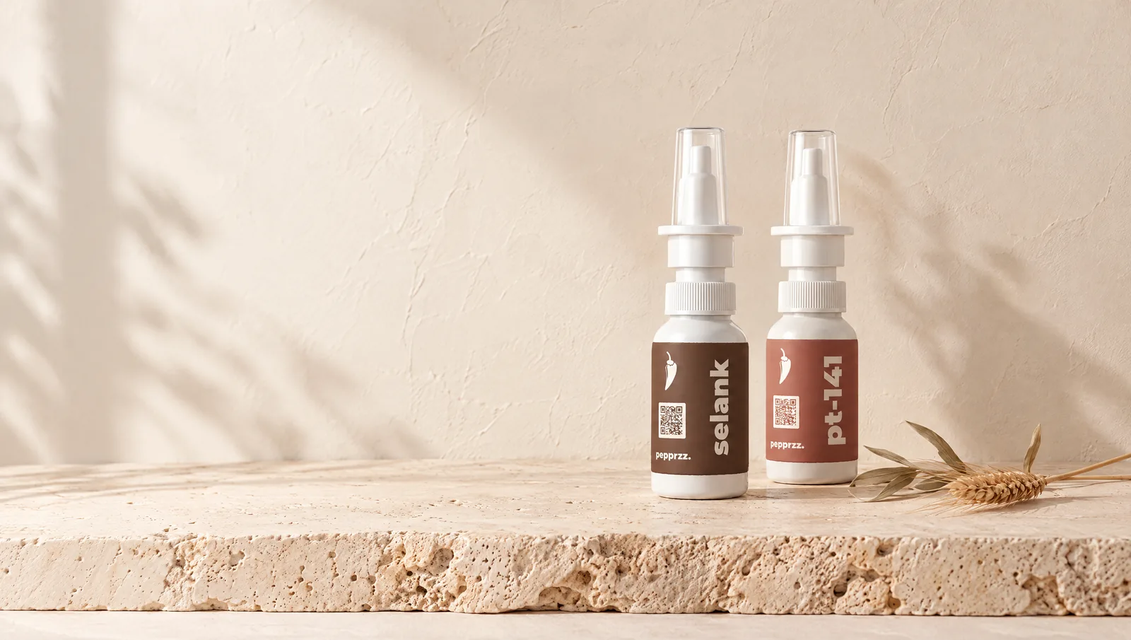 pepprzz selank and pt-141 nasal spray bottles on travertine